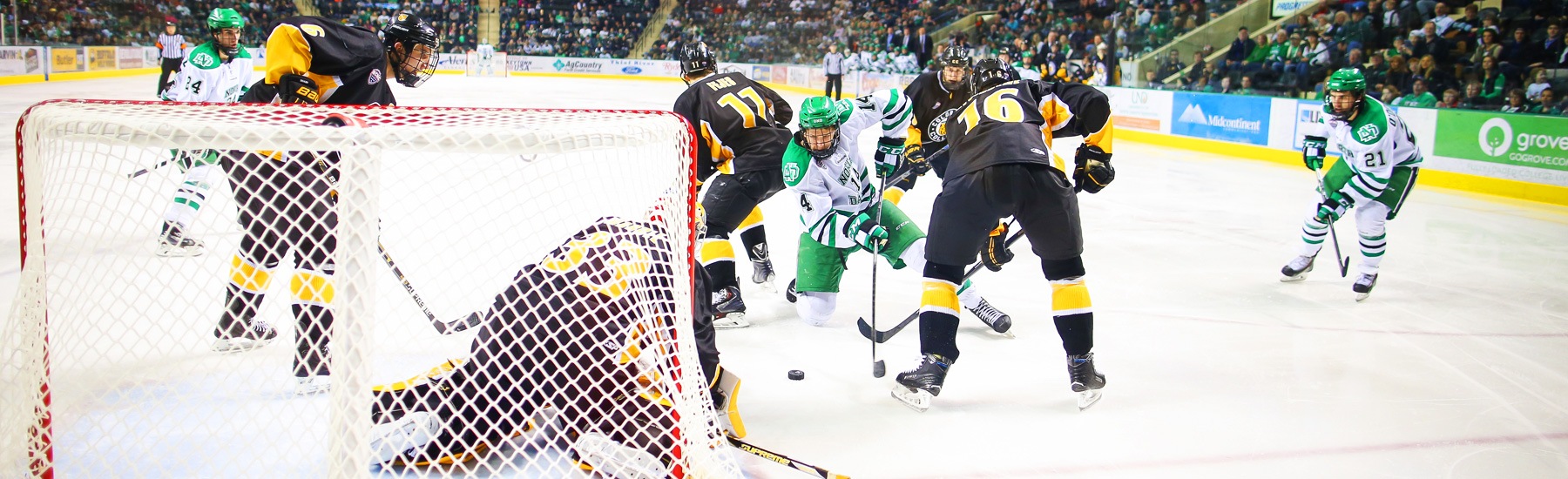 UND hockey Player scoring a goal at Grand Forks hockey UND Athletics