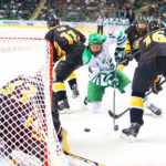 UND hockey Player scoring a goal at Grand Forks hockey UND Athletics