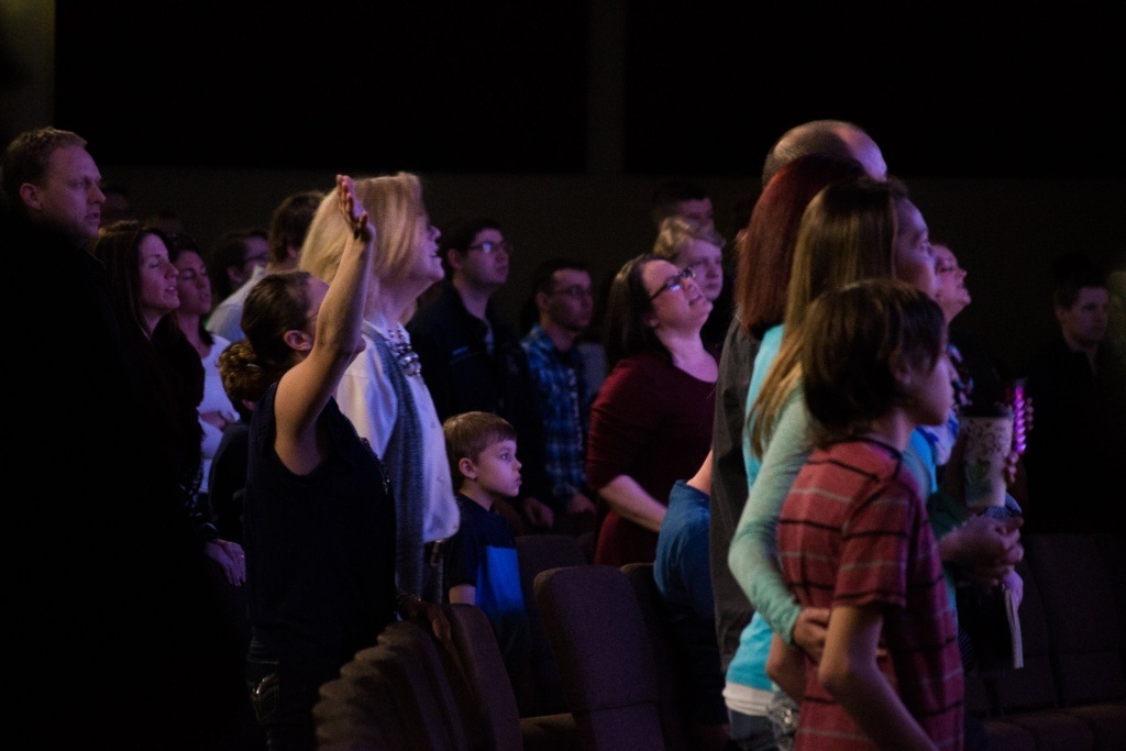 Group Worshipping at Grand Forks HOPE Church