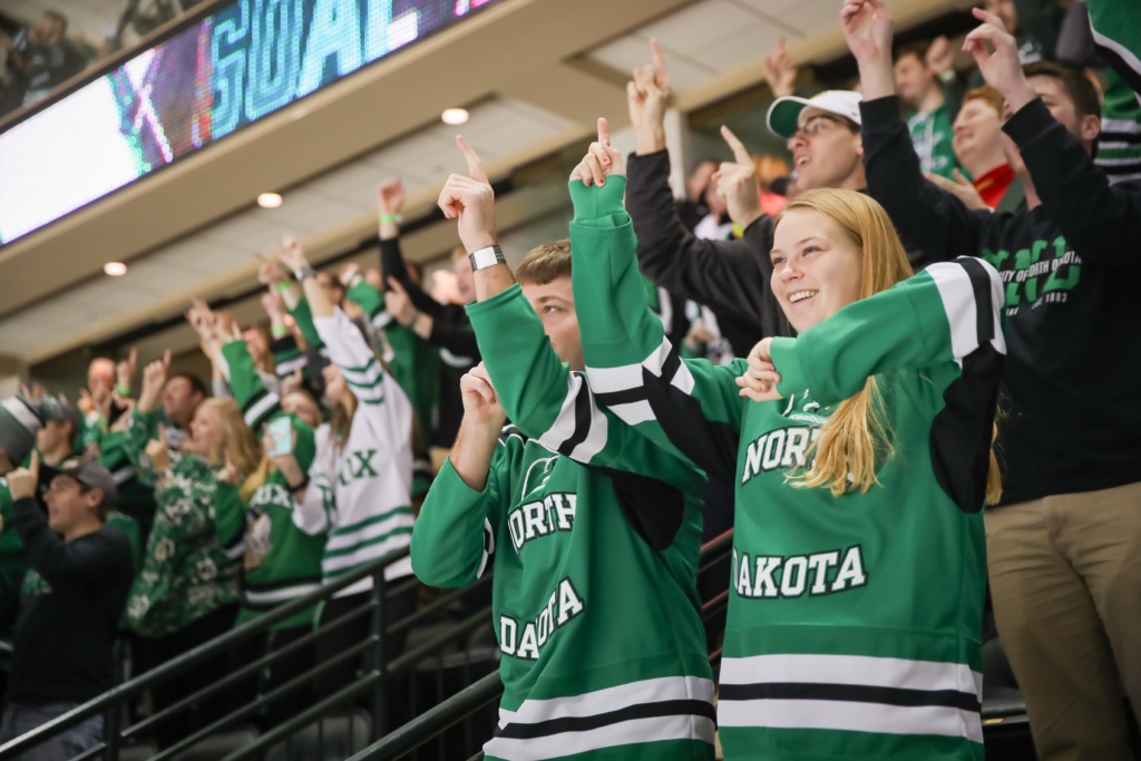 UND Fans Cheering at Hockey Game in Grand Forks photo by Shawna Noel Schill