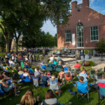 Kids at the North Dakota Museum of Art listening to music as a fun kid activity.