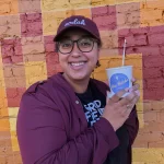 Myra holding a You Betch! ice cream from a local business in Grand Forks