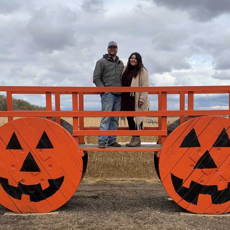 Alizjah and her boyfriend at a pumpkin patch outside Grand Forks during the fall