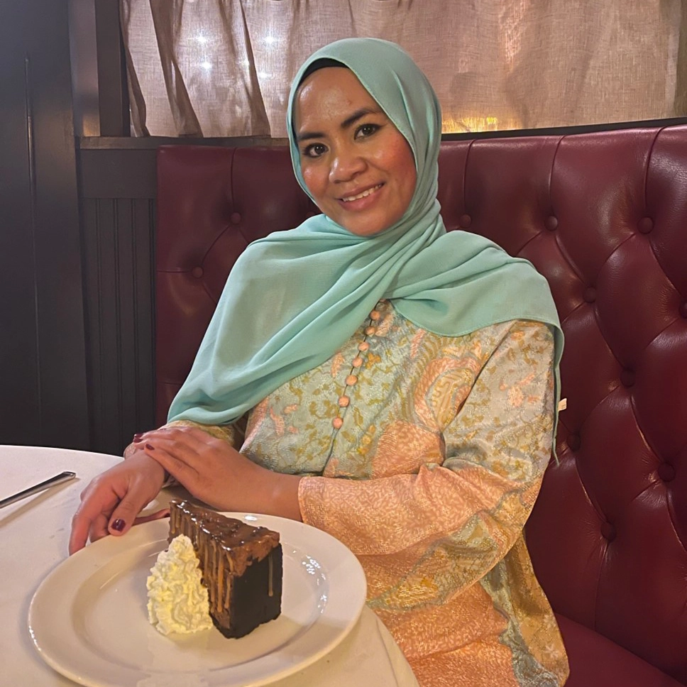 Fifi posed with chocolate cake from Harry's Steakhouse