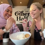 Fifi and friend sharing a sweet treat in Grand Forks