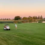 King's Walk golf course in Grand Forks at sunset.