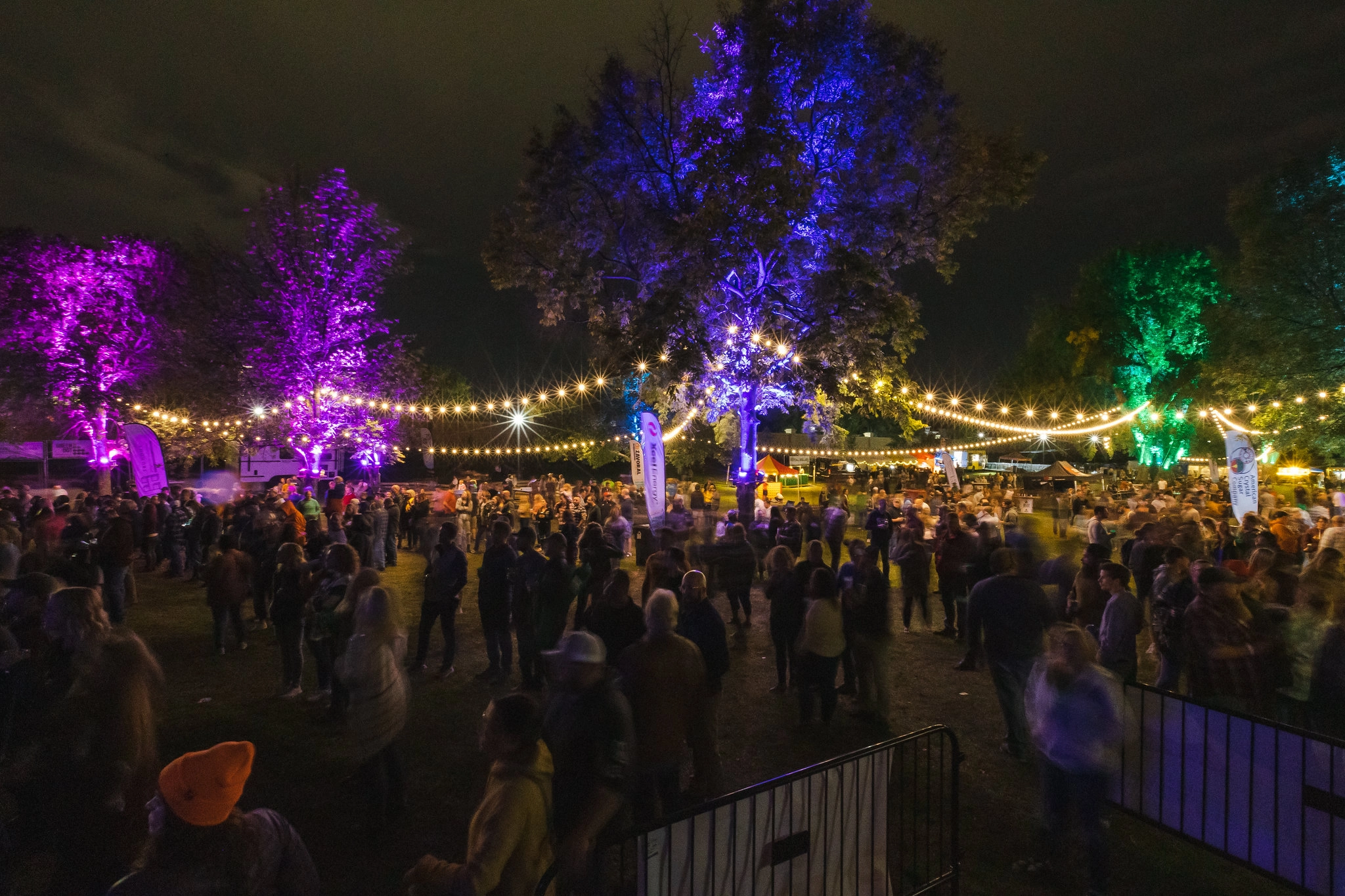 The crowd at the Greenway in Grand Forks at night.