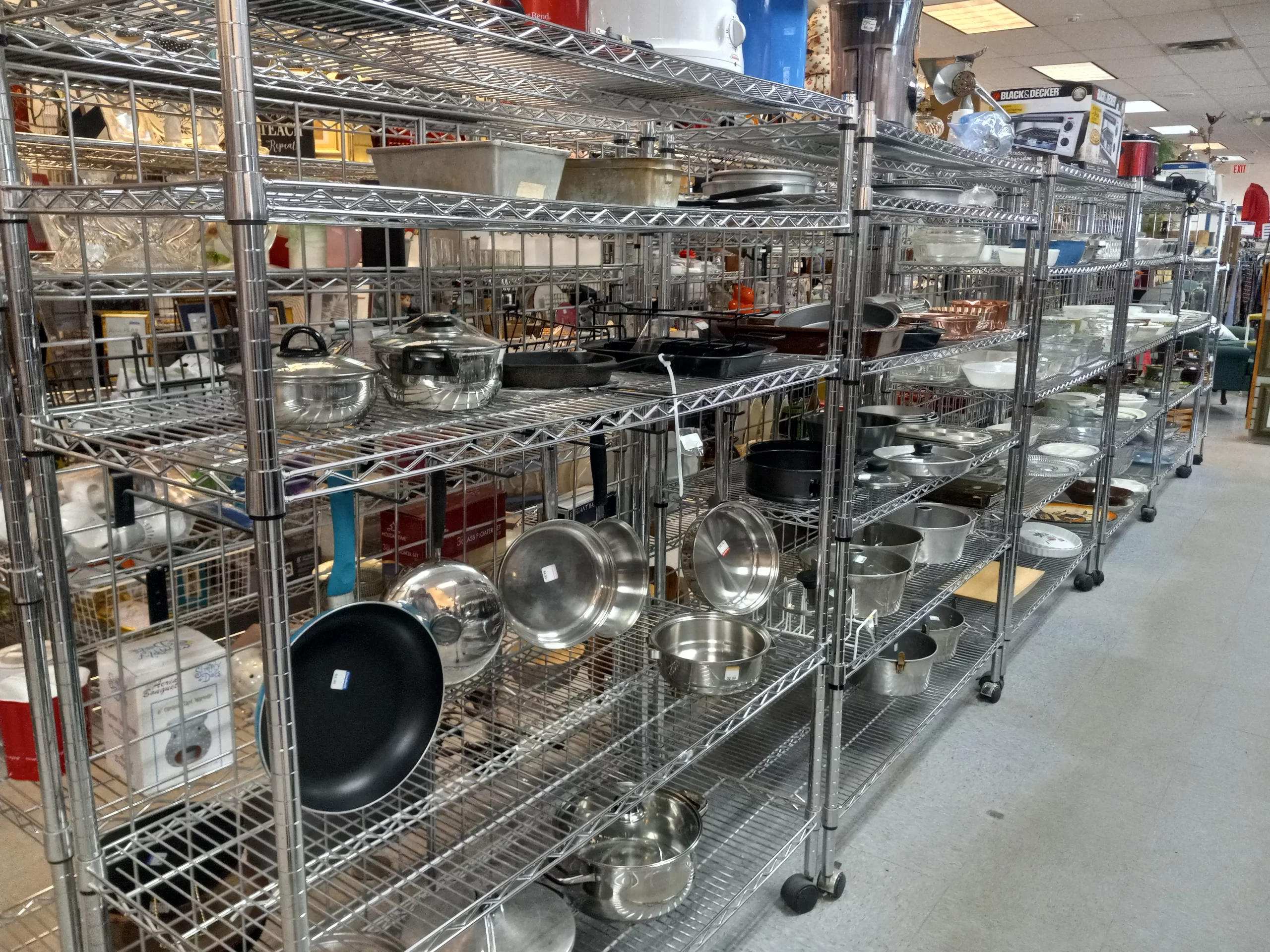 Kitchenware on shelves at Thrift Store in Grand Forks.