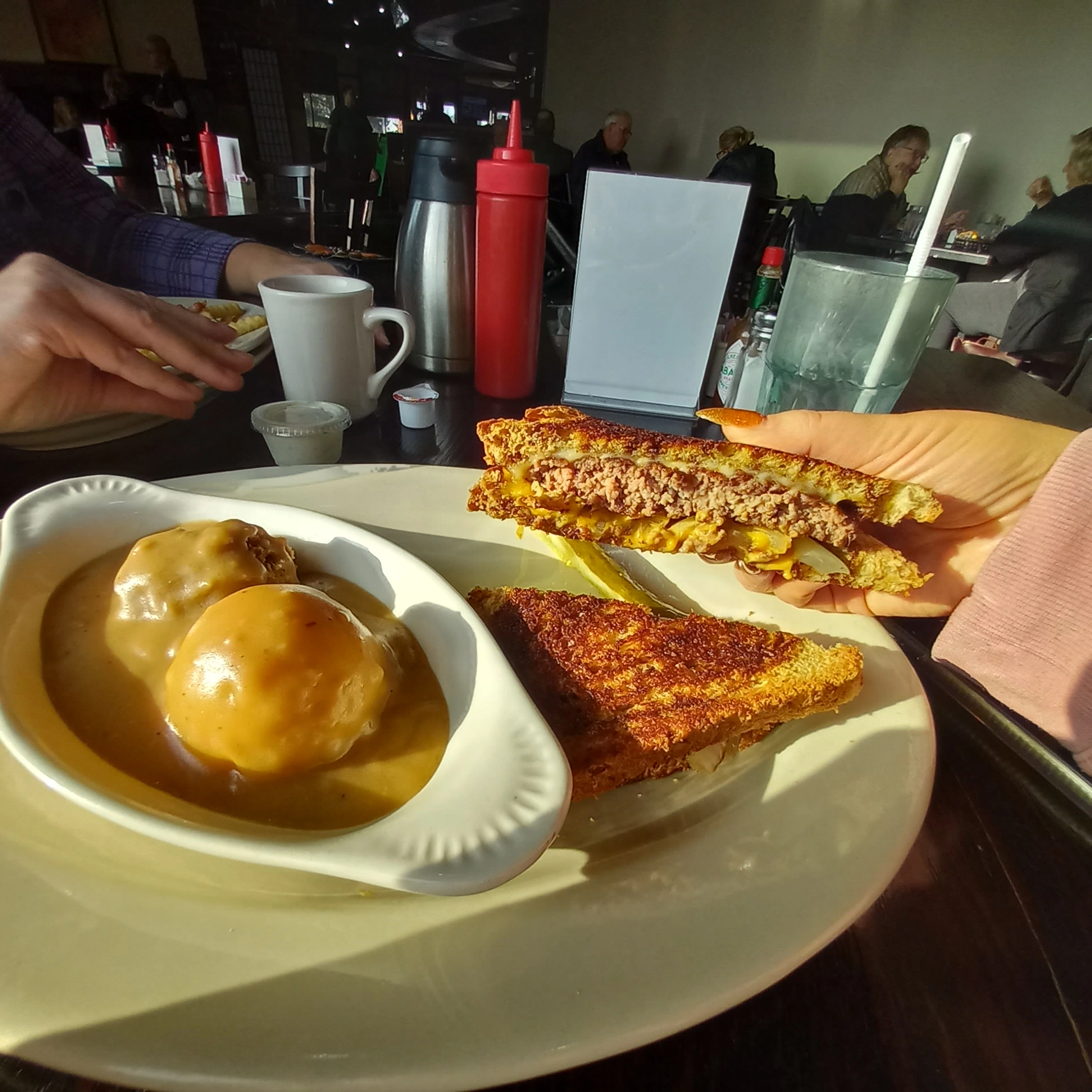 Sandwich and mashed potatoes at a cafe in grand forks