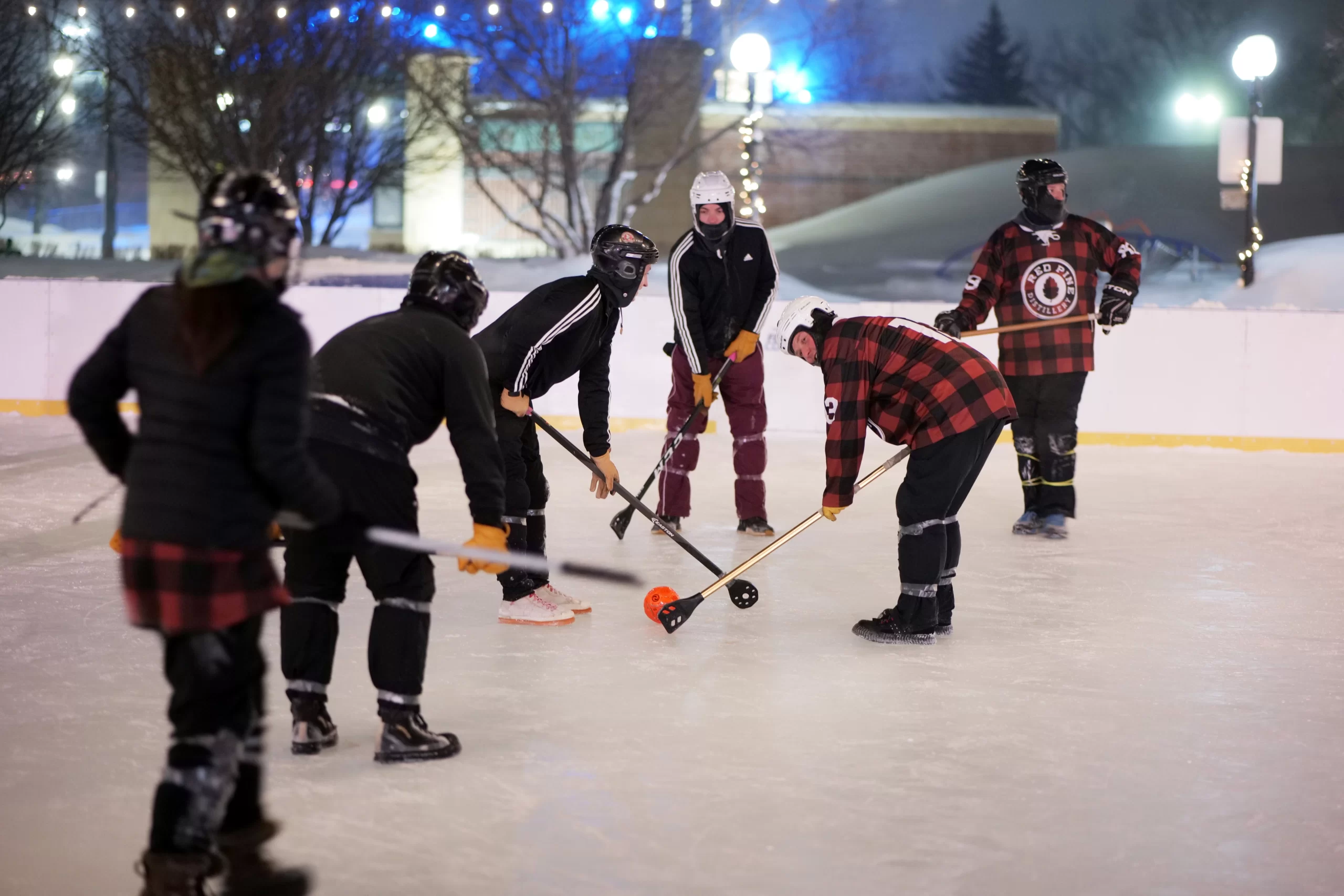 Winter in Grand Forks broomball in town square