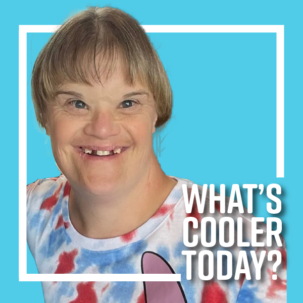 What's Cooler Today author Erin in front of a blue backdrop