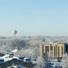 Arial view of Grand forks in the winter with the water tower on the horizon.