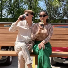 Two people sitting drinking Bully Brew Coffee in Grand Forks.