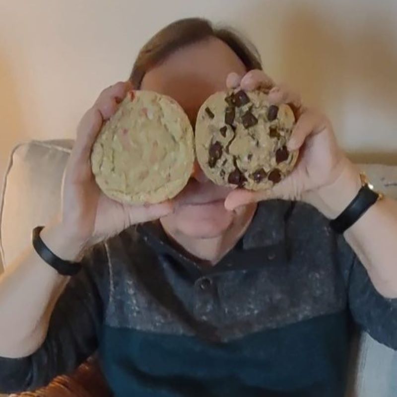 Writer Terry posing with two cookies over his eyes.
