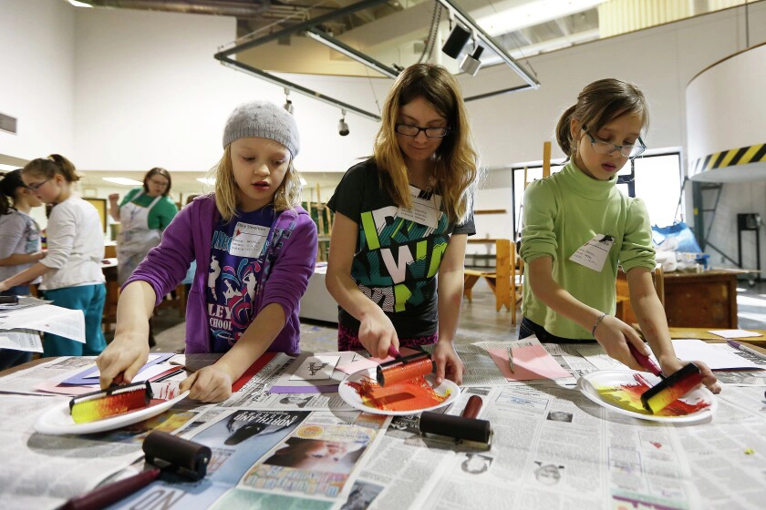 Kids participating in an art project in Grand Forks.