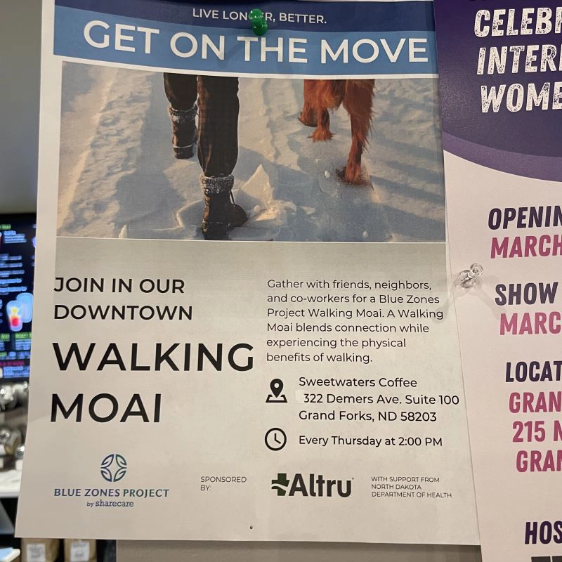 Blue Zones walking MOAI sign that reads 'get on the move' in Grand Forks.