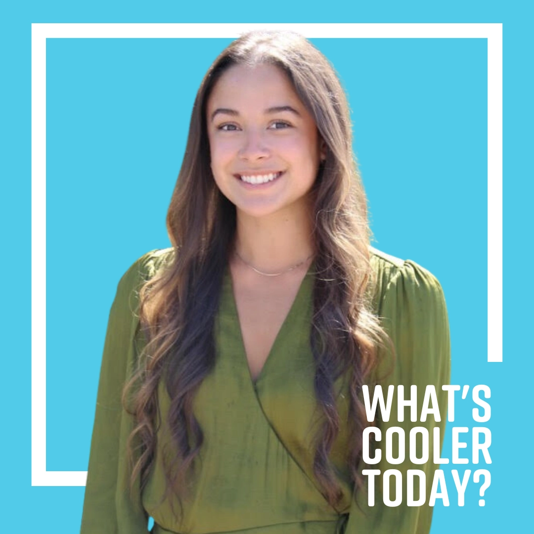 'What's Cooler Today?' Author Hennessy stands in front of blue background