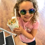 Brae holding Ice Cream from Tea and Crepe in Grand Forks.