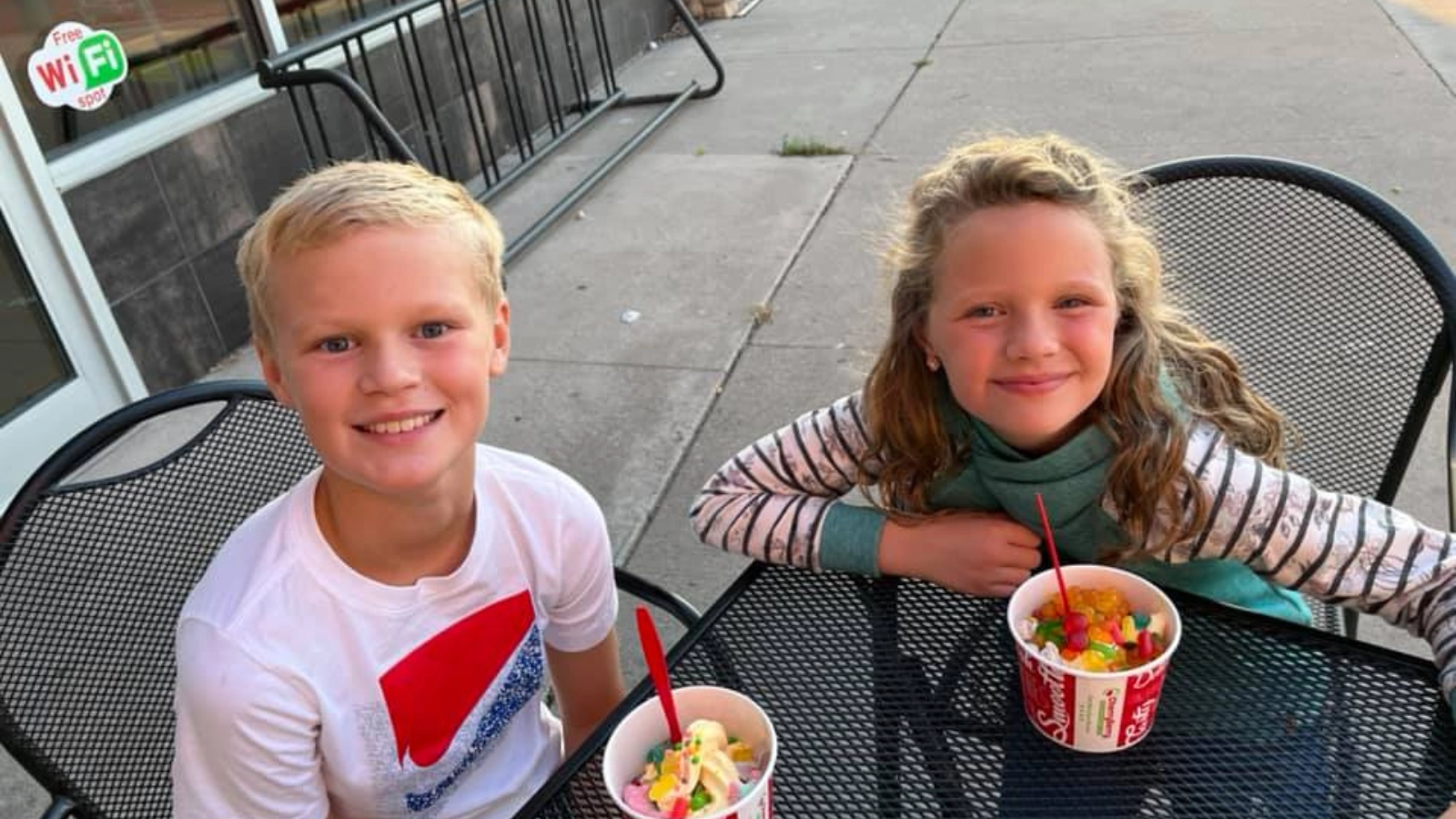 Ice cream in Grand Forks. Two kids enjoying Cherry Berry.