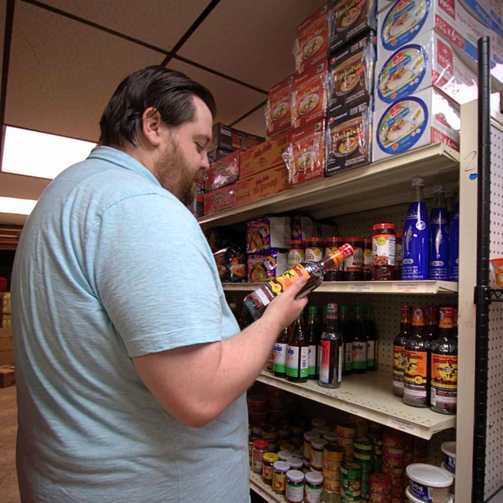 What's Cooler Today writer Zach browses the shelves of FM International Market in search of his next cooking ingredient.