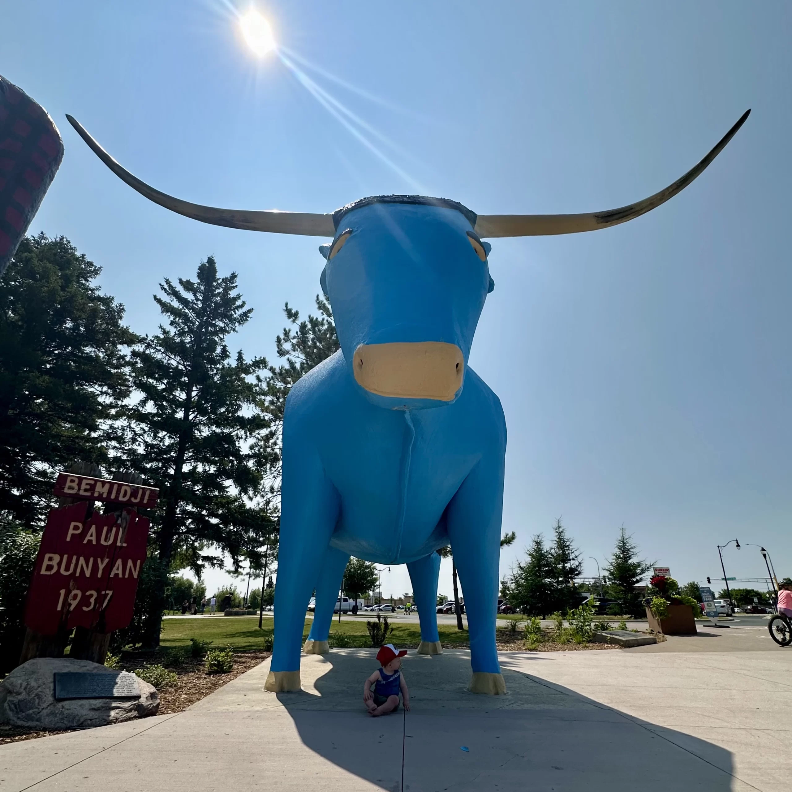 Blue Ox statue with baby underneath in Bemidji from 1937.