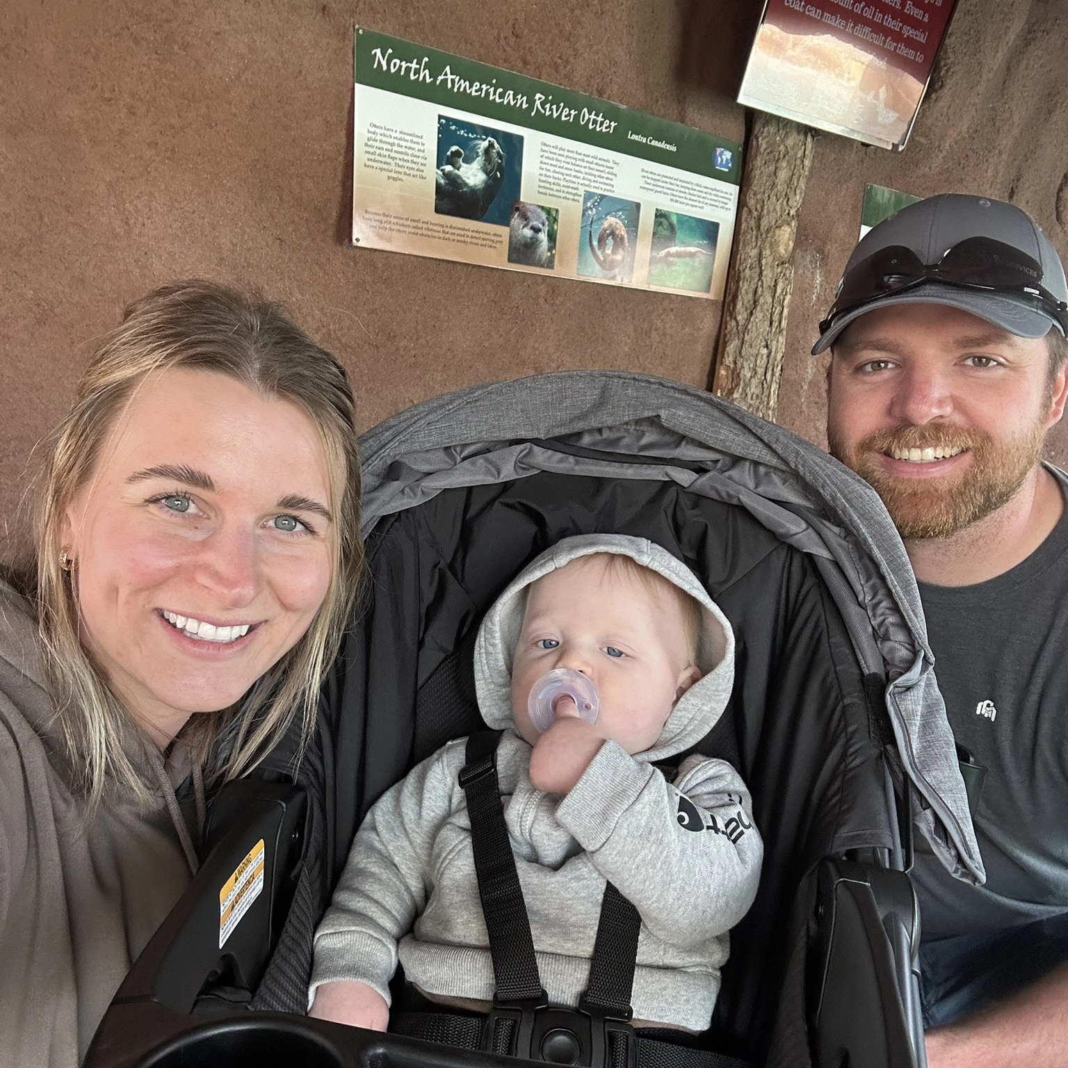 Mom, dad, and baby at the Red River Zoo in Fargo.