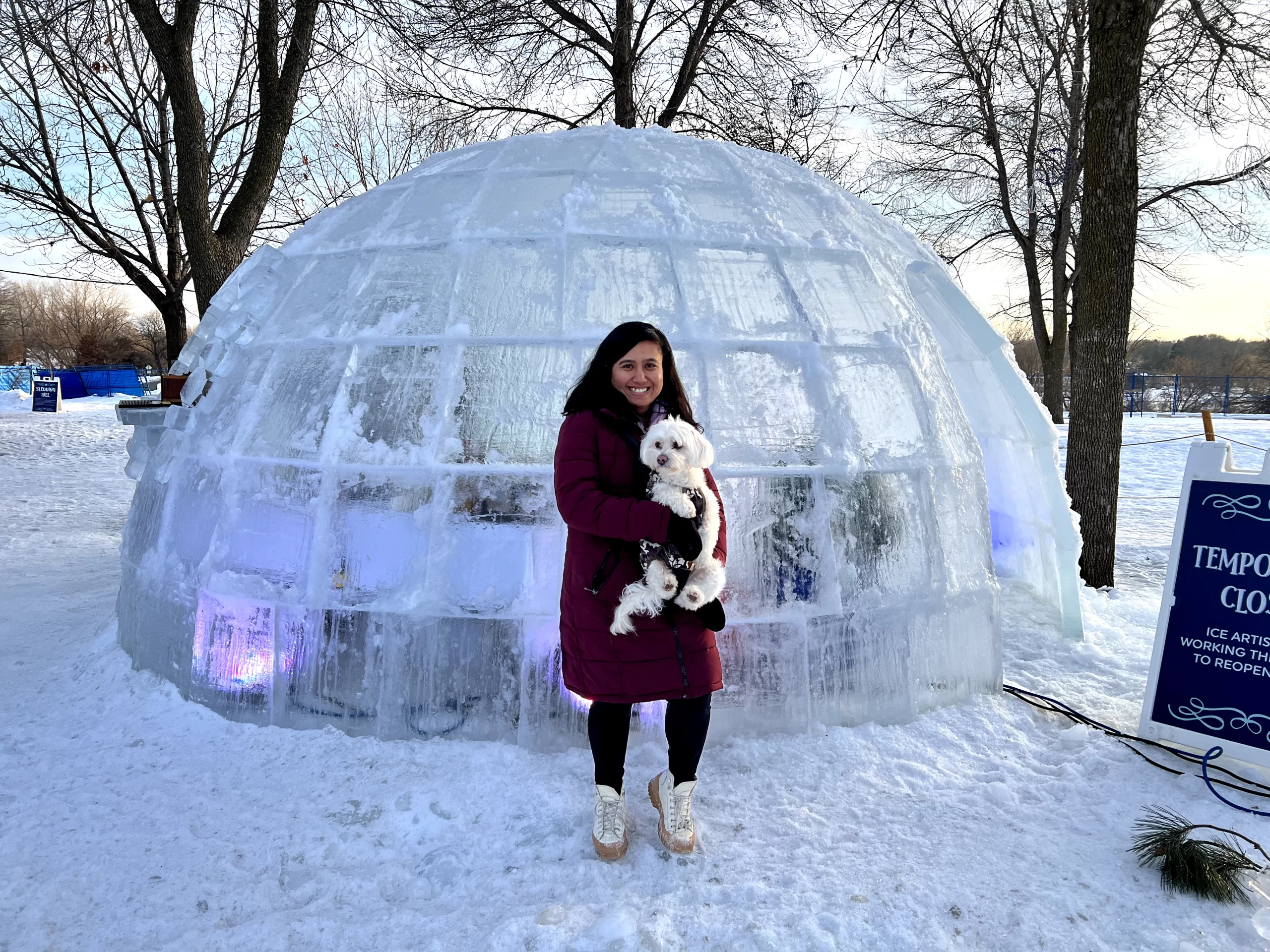 Benu and her puppy outside of an igloo in Grand Forks.