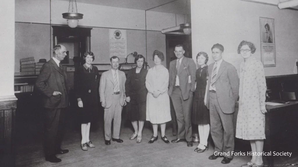 Bank of ND employees in the mid-1900s stand for a team photo together.