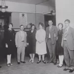 Bank of ND employees in the mid-1900s stand for a team photo together.