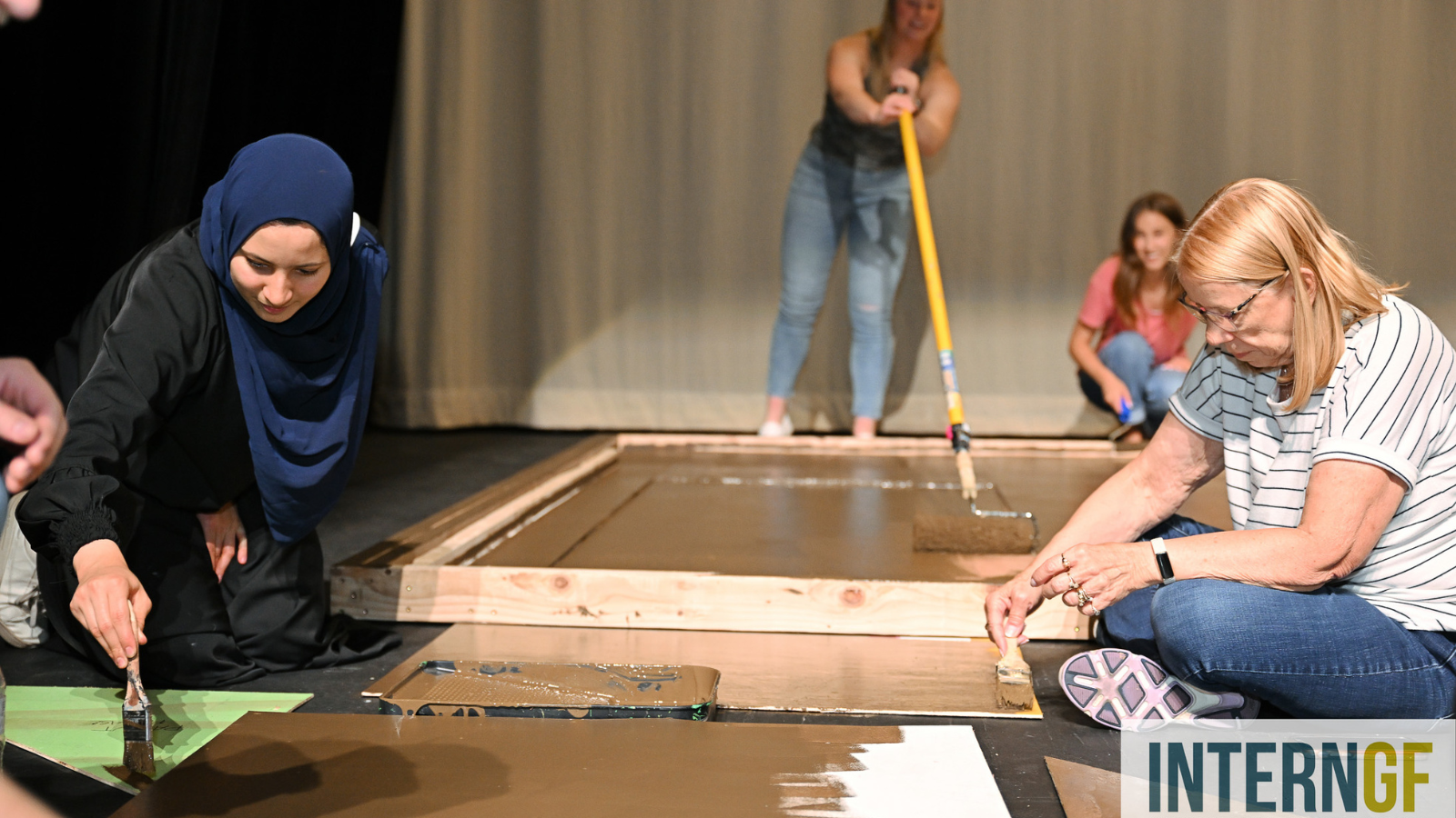 InternGF photos of interns helping build probs for a theater production.