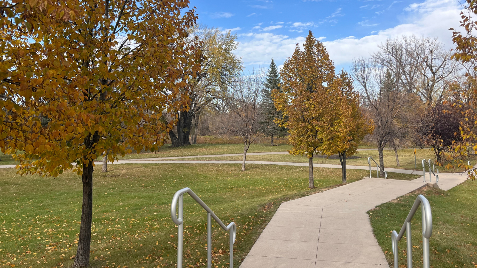 Greenway entrance with a nice view of the fall foliage you can see