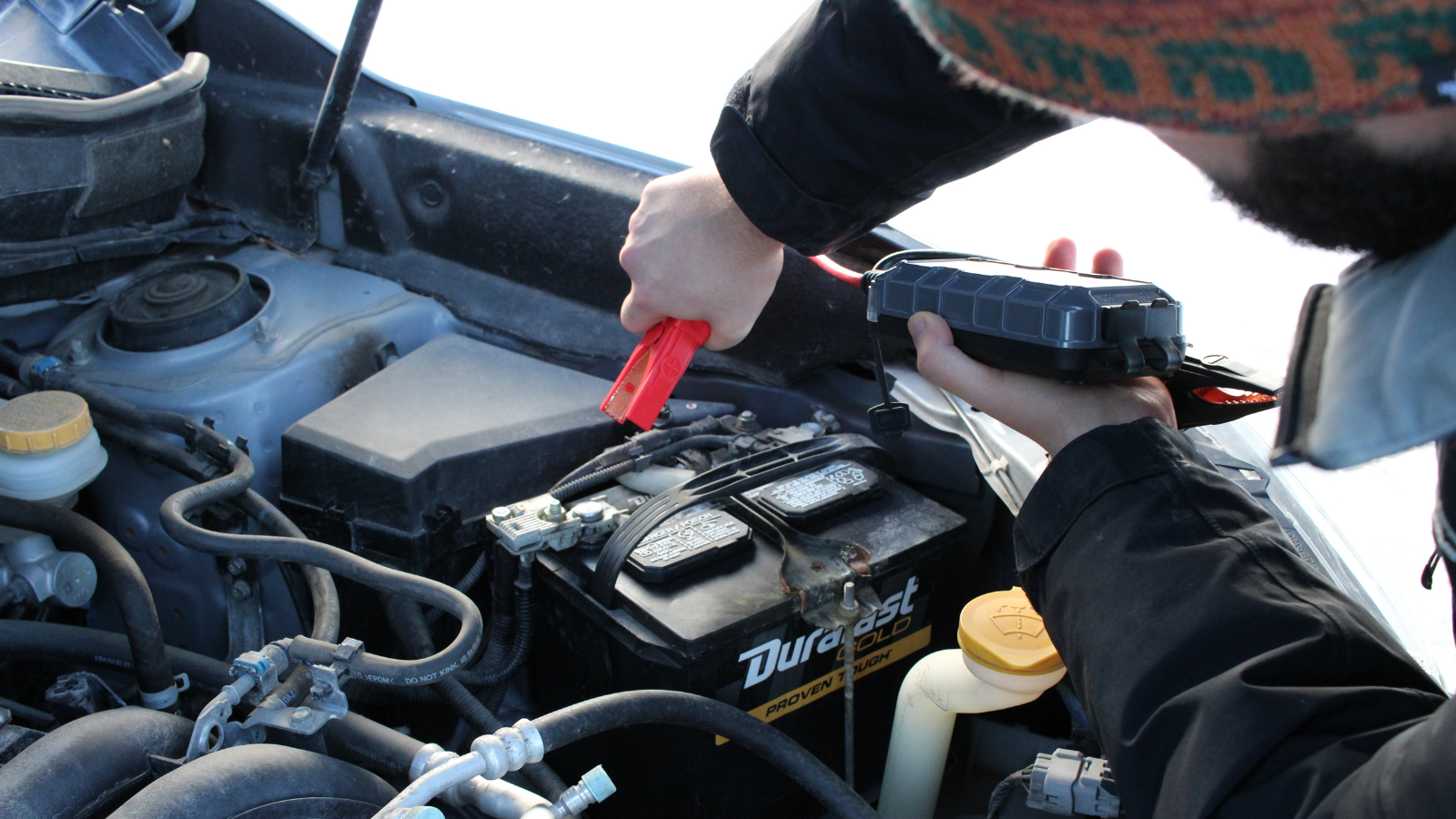 Author Eli demonstrates using jumper cables to kickstart your car back to life!