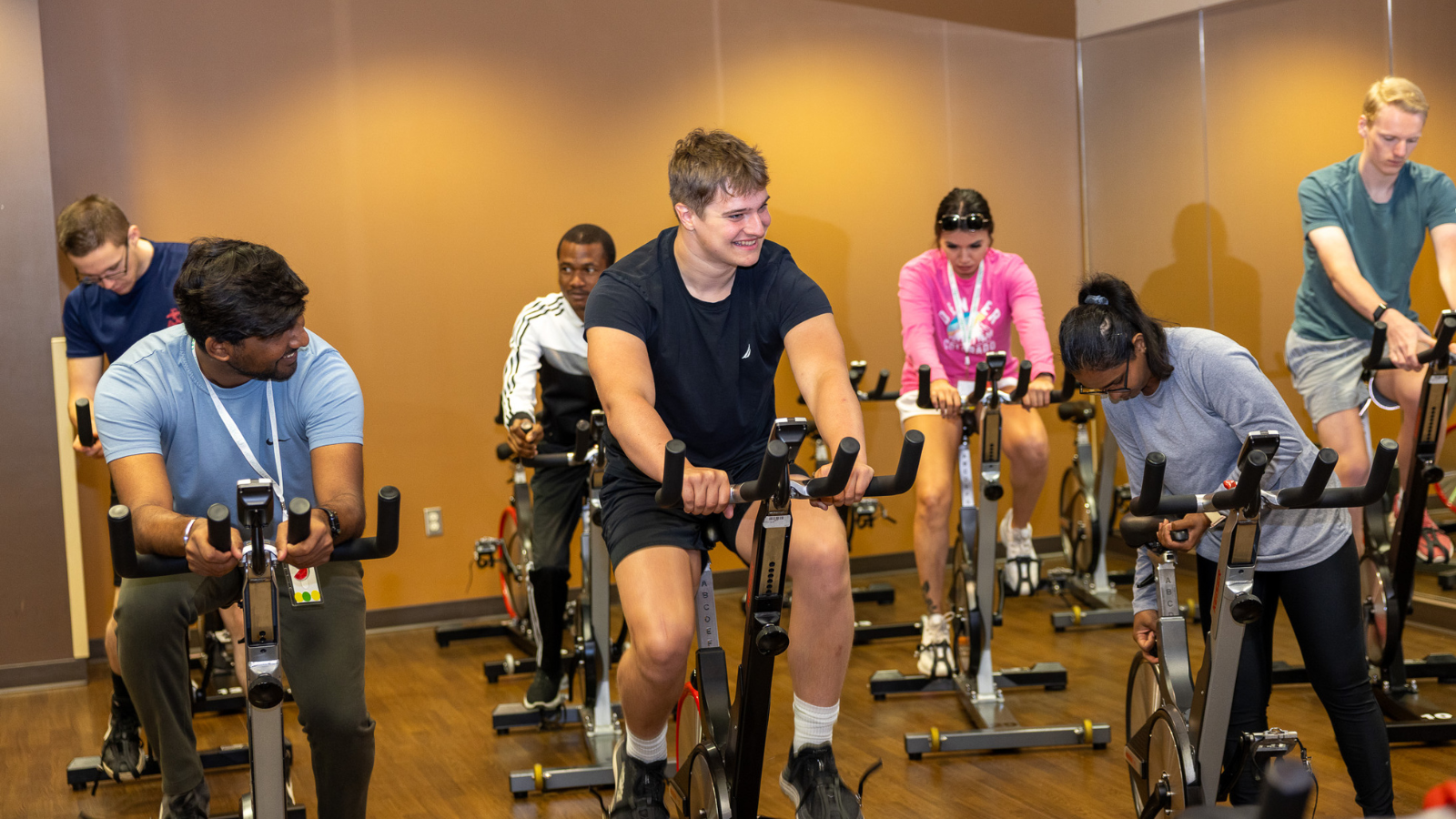 Choice Fitness group cycling class photo. Lots of smiles all around!