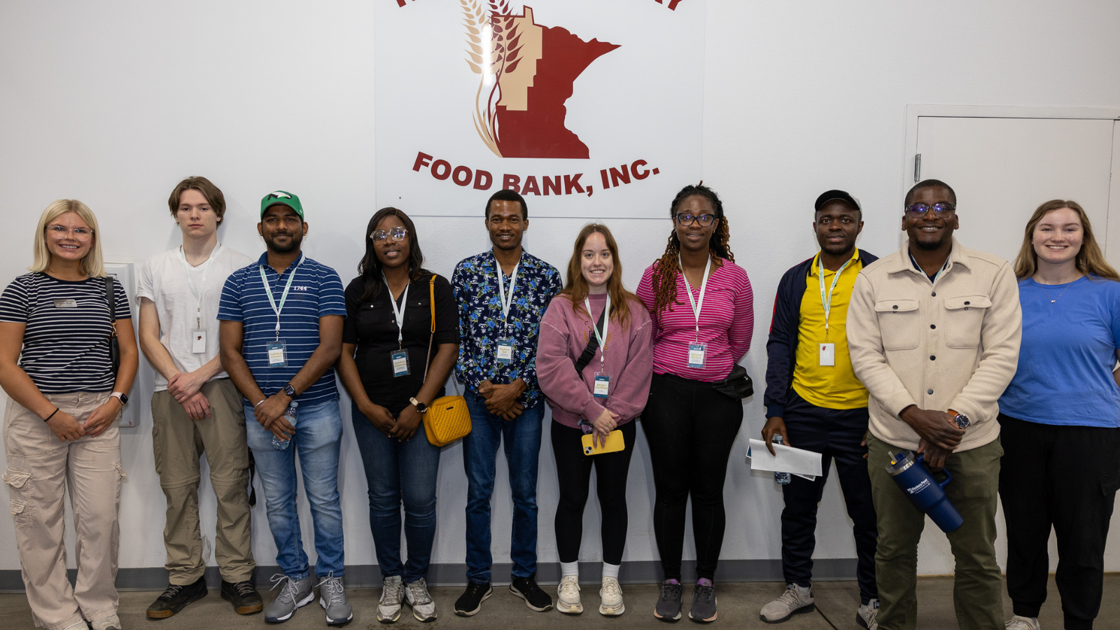 A group of volunteers poses for a photo after helping at the Food Bank