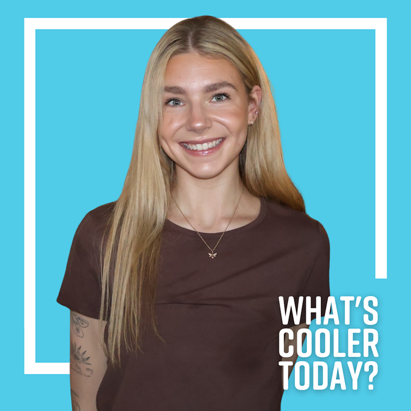 Author Jori smiles at the photo in a brown t-shirt for her headshot