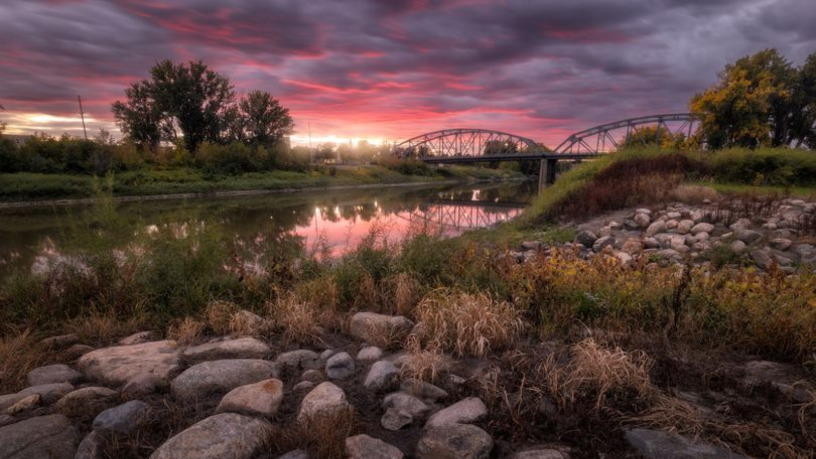 Grand Forks river view sunset with the bridge in the background