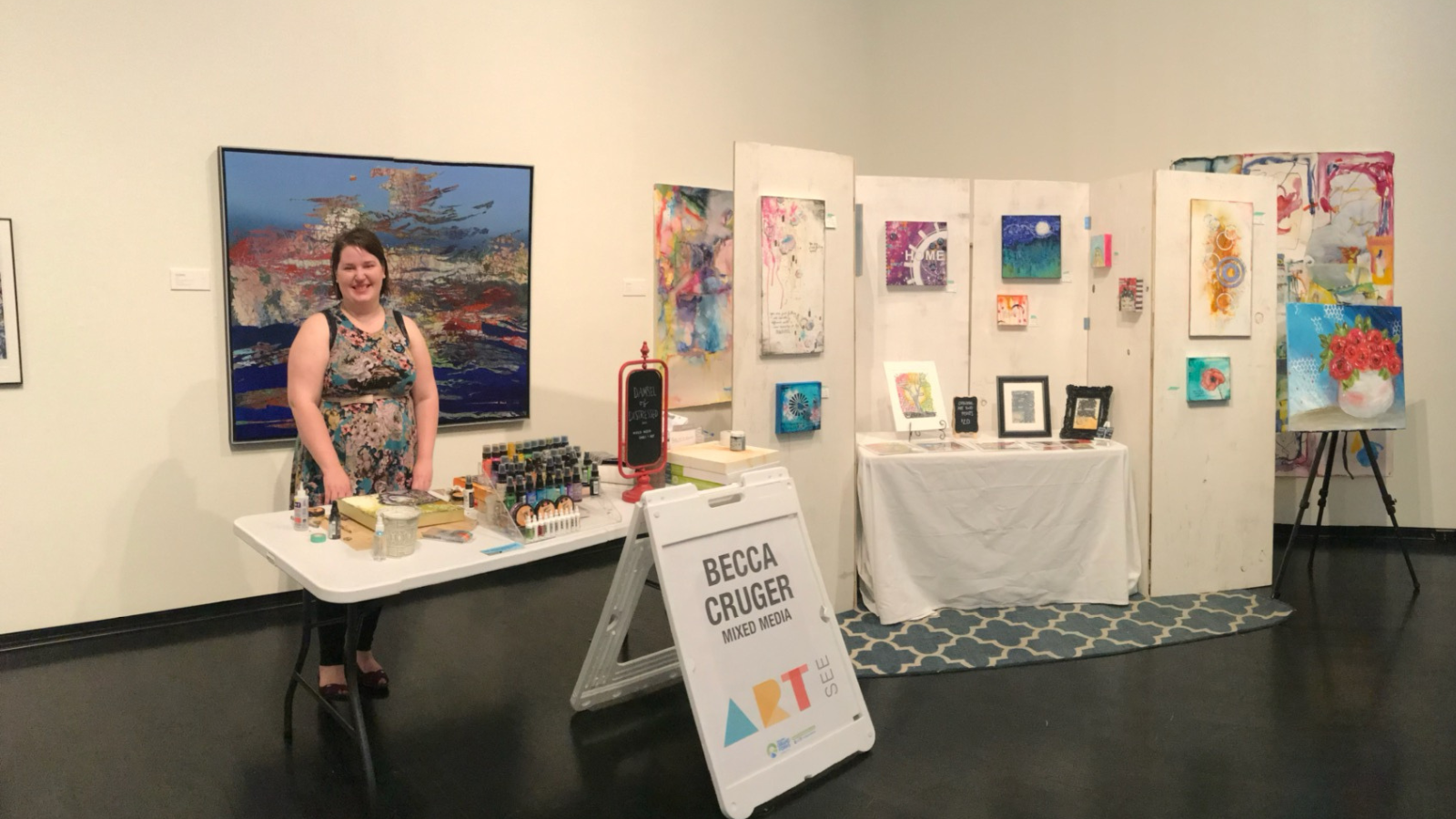 ArtSee Image of artis Becca Cruger and her booth!